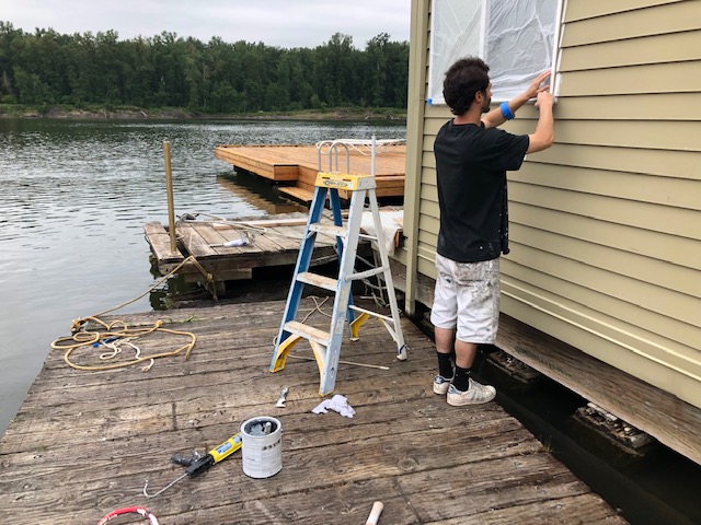 Clean interior repaint with protected floors and furniture